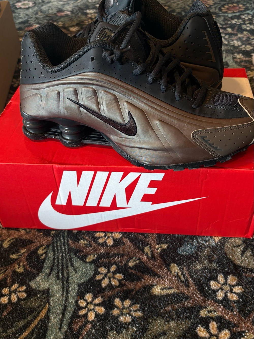 Nike women’s Black and Bronze Shox Performance Sneakers